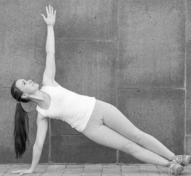 Woman performing yoga pose